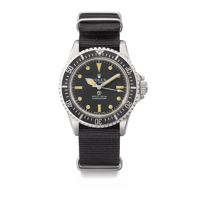 ROLEX. A VERY RARE STAINLESS STEEL AUTOMATIC WRISTWATCH WITH SWEEP CENTRE SECONDS AND HACK FEATURE, MADE FOR THE BRITISH ROYAL NAVY SIGNED ROLEX, SUBMARINER 'MILSUB' MODEL, REF. 5513, CASE NO. 3'927'103, CIRCA 1975