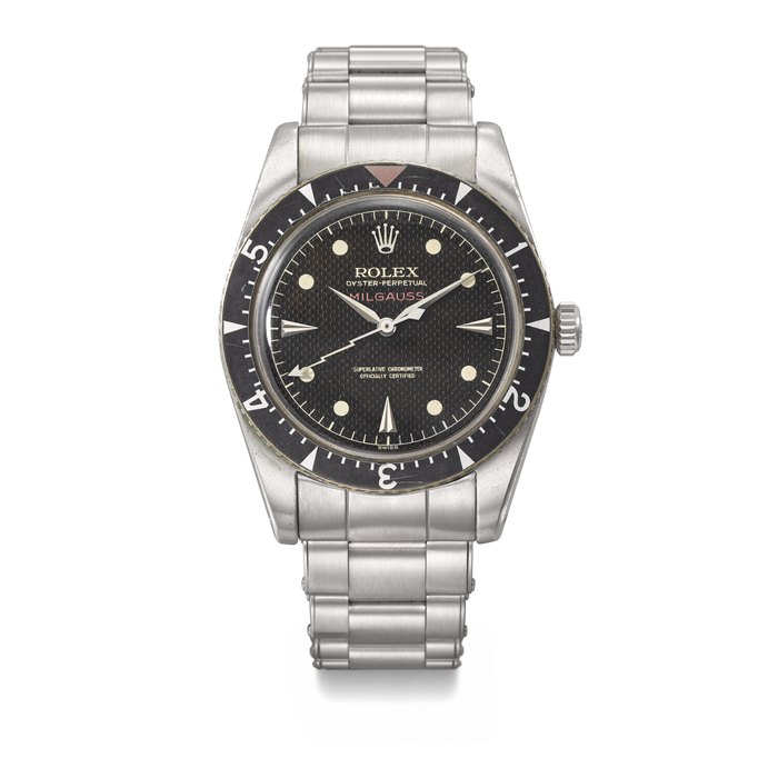 ROLEX. AN EXCEEDINGLY RARE AND IMPORTANT STAINLESS STEEL AUTOMATIC WRISTWATCH WITH BLACK HONEYCOMB DIAL AND BRACELET SIGNED ROLEX, MILGAUSS MODEL, REF. 6541, CASE NO. 412'254, CIRCA 1958
