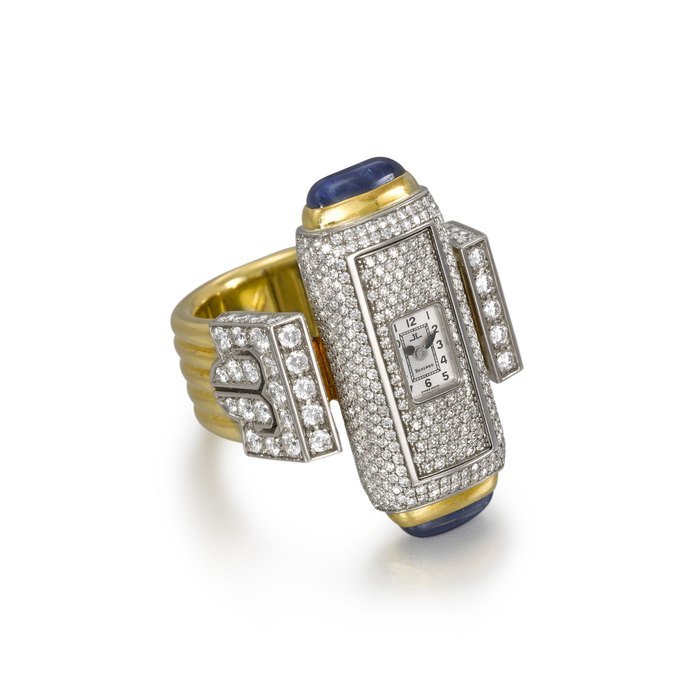 Jaeger-Lecoultre JAEGER-LECOULTRE. A HIGHLY ATTRACTIVE TWO-COLOUR GOLD , DIAMOND AND CABOCHON S APPHIRE -SET BACK WINDING REVERSIBLE RING WATCH SIGNED JAEGER-LECOULTRE, REVERSO, CALIBRE 101 JOALLERIE MODEL, NO. 2, CIRCA 2000