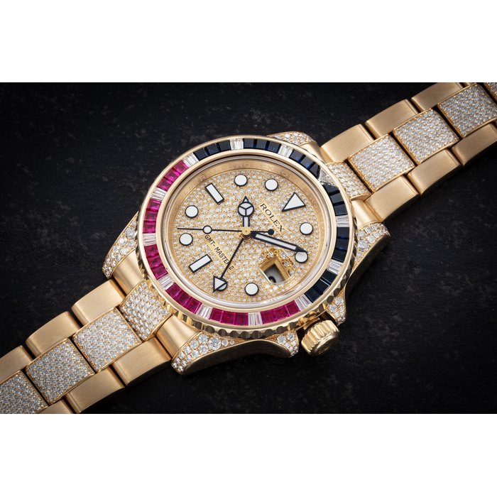 ROLEX, GMT-MASTER II REF. 116578 ‘SARU’, AN ATTRACTIVE GOLD, RUBY, SAPPHIRE AND DIAMOND-SET DUAL TIME AUTOMATIC WRISTWATCH CASE NUMBER: V743'295