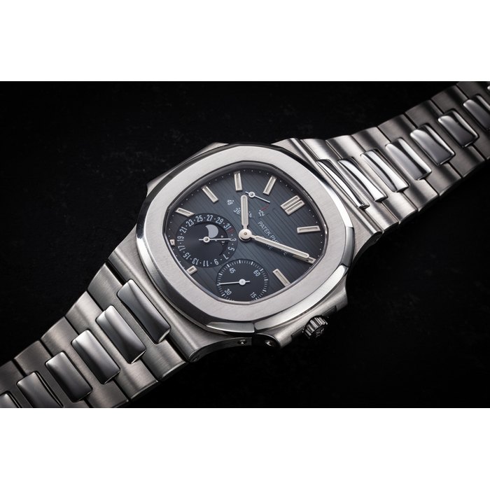 PATEK PHILIPPE, NAUTILUS REF. 3712/1A-001 'FIRST SERIES', A RARE STEEL AUTOMATIC WRISTWATCH WITH MOON PHASE AND POWER RESERVE CASE NUMBER: 4’330’385, MOVEMENT NUMBER: 3’171’015