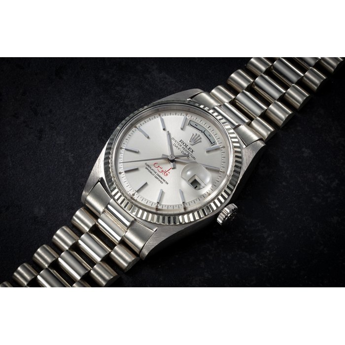 ROLEX, DAY-DATE REF. 1803/9 ‘QABOOS’, A RARE AND IMPORTANT GOLD AUTOMATIC WRISTWATCH WITH THE SIGNATURE OF SULTAN QABOOS BIN SAID CASE NUMBER: 3’075’293, MOVEMENT NUMBER: 777’938
