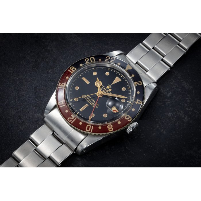 ROLEX, GMT-MASTER REF. 6542 'BAKELITE', A RARE AND IMPORTANT STEEL DUAL TIME WRISTWATCH CASE NUMBER: 427’397, MOVEMENT NUMBER: N 806’718