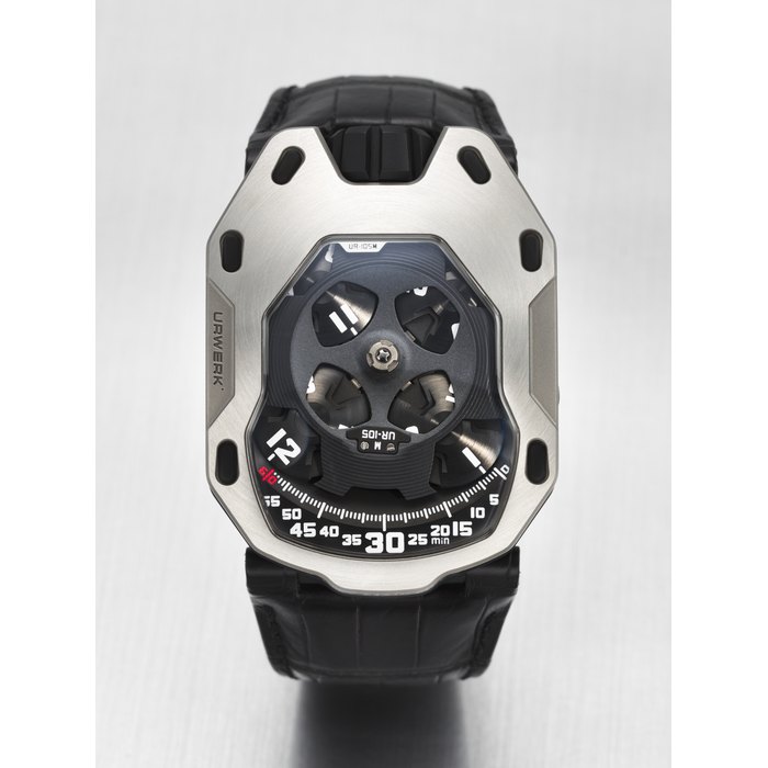 URWERK. A RARE AND UNUSUAL STAINLESS STEEL AND TITANIUM LIMITED EDITION SHIELD-SHAPED WRISTWATCH WITH WANDERING HOUR DISPLAY, POWER RESERVE AND OIL CHANGE INDICATOR SIGNED URWERK, 'IRON KNIGHT' MODEL, REF. UR-105M, NO. 25/77, CIRCA 2014