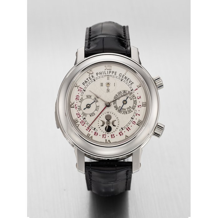 Patek Philippe PATEK PHILIPPE. A MAGNIFICENT AND EXTREMELY RARE PLATINUM DOUBLE-DIAL WRISTWATCH WITH TWELVE COMPLICATIONS INCLUDING 'CATHEDRAL' MINUTE REPEATING TOURBILLON, PERPETUAL CALENDAR WITH RETROGRADE DATE, MOON AGE AND ANGULAR MOTION, SIDEREAL TIME AND SKY CHART SIGNED PATEK PHILIPPE, GENEVE, SKY MOON TOURBILLON MODEL, REF. 5002P-001, MOVEMENT NO. 5'000'704, CASE NO. 4'544'887, CIRCA 2011 · 5002P-001