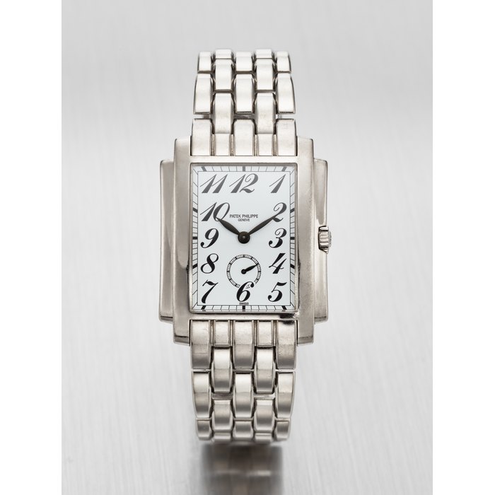 PATEK PHILIPPE. AN ATTRACTIVE AND HEAVY 18K WHITE GOLD WRISTWATCH WITH BRACELET SIGNED PATEK PHILIPPE, GENEVE, REF. REF. 5024/1G-011, MOVEMENT NO. 1'883'177, CASE NO. 4'178'035, CIRCA 2009