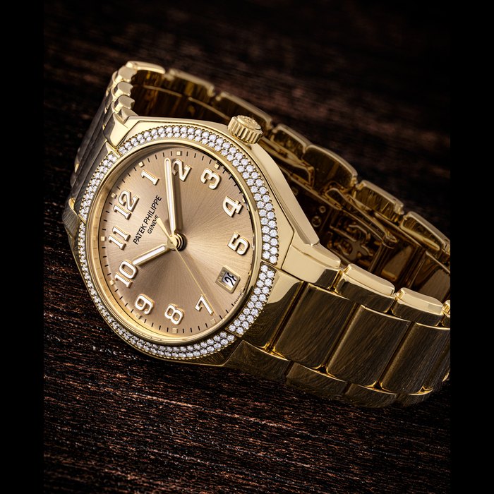 PATEK PHILIPPE. A LADY’S ELEGANT 18K PINK GOLD AND DIAMOND-SET AUTOMATIC WRISTWATCH WITH SWEEP CENTRE SECONDS, DATE AND BRACELET TWENTY~4 MODEL, REF. 7300/1200R-011, CIRCA 2021
