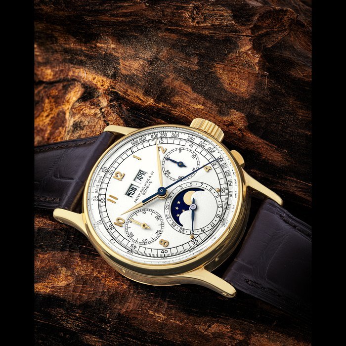 Patek Philippe PATEK PHILIPPE. AN EARLY AND VERY RARE 18K GOLD PERPETUAL CALENDAR CHRONOGRAPH WRISTWATCH WITH MOON PHASES REF. 1518J, FIRST SERIES, MK3 DIAL, MANUFACTURED IN 1943 · 1518J