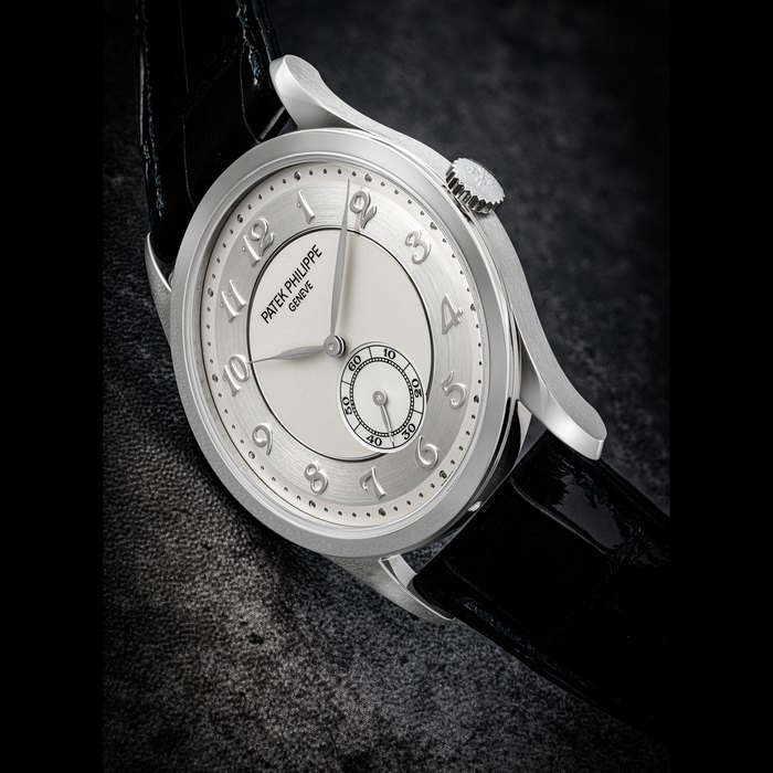 PATEK PHILIPPE. A PLATINUM WRISTWATCH WITH TWO-TONE DIAL AND BREGUET NUMERALS CALATRAVA MODEL, REF.5196P-001, CIRCA 2020