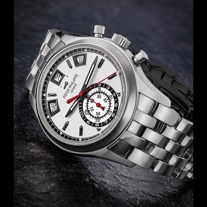 PATEK PHILIPPE. A STAINLESS STEEL AUTOMATIC ANNUAL CALENDAR FLYBACK CHRONOGRAPH WRISTWATCH WITH DAY/NIGHT INDICATION, POWER RESERVE AND BRACELET REF. 5960/1A-001, CIRCA 2016