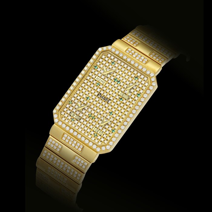 PIAGET, GOLD AND DIAMOND-SET FOUR TIME ZONE BRACELET WATCH CASE NO. 456'199, 15'425, C567