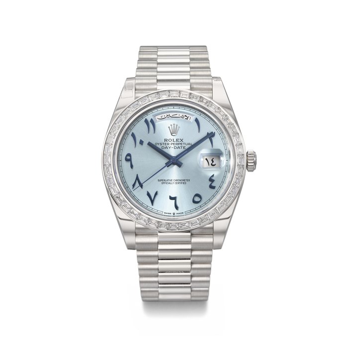 ROLEX. AN EXTREMELY RARE AND IMPRESSIVE PLATINUM AND DIAMOND-SET AUTOMATIC WRISTWATCH WITH SWEEP CENTRE SECONDS, ARABIC CALENDAR, EASTERN ARABIC NUMERALS AND BRACELET SIGNED ROLEX, DAY-DATE MODEL, REF. 228396TBR, CASE NO. 0XQ28222, CIRCA 2021