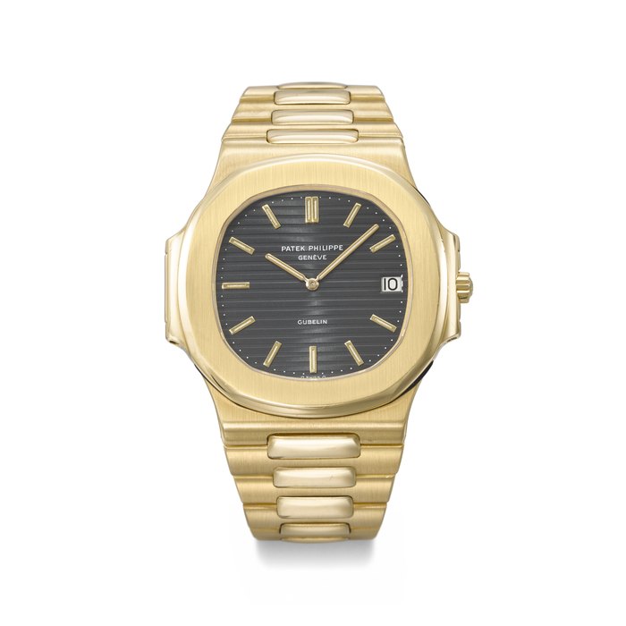 PATEK PHILIPPE. AN EXTREMELY RARE AND ATTRACTIVE 18K GOLD AUTOMATIC WRISTWATCH WITH DATE AND BRACELET SIGNED PATEK PHILIPPE, GENEVE, RETAILED BY GUBELIN, REF. 3700/011, MOVEMENT NO. 1'310'867, CASE NO. 2'808'655, CIRCA 1985