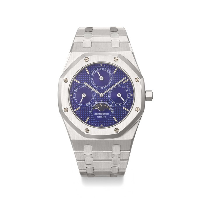 AUDEMARS PIGUET. A COVETED AND ATTRACTIVE STAINLESS STEEL AUTOMATIC PERPETUAL CALENDAR WRISTWATCH WITH MOON PHASES, 'SAPPHIRE BLUE' DIAL AND BRACELET SIGNED AUDEMARS PIGUET, ROYAL OAK QUANTIEME PERPETUEL MODEL, REF. 25654ST, NO. 536, CIRCA 1990