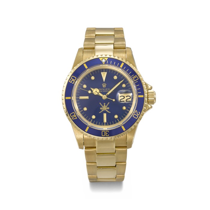 ROLEX. AN EXTREMELY RARE AND IMPORTANT 18K GOLD AUTOMATIC WRISTWATCH WITH SWEEP CENTRE SECONDS, DATE AND BRACELET, MADE FOR THE SULTANATE OF OMAN SIGNED ROLEX, SUBMARINER MODEL, REF. 1680, CASE NO. 3’566’328, CIRCA 1973