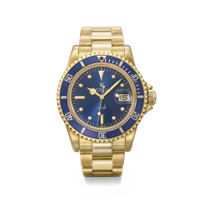 ROLEX. AN EXTREMELY RARE AND HIGHLY ATTRACTIVE 18K GOLD AUTOMATIC WRISTWATCH WITH SWEEP CENTRE SECONDS, DATE AND BRACELET, MADE FOR THE SULTANATE OF OMAN SIGNED ROLEX, SUBMARINER MODEL, REF. 1680, CASE NO. 3'566'341, CIRCA 1973