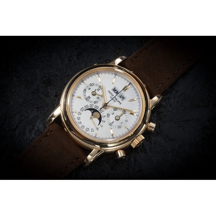 PATEK PHILIPPE, REF. 3970E, A FINE FOURTH SERIES YELLOW GOLD PERPETUAL CALENDAR CHRONOGRAPH WRISTWATCH CASE NUMBER: 2’945’283; MOVEMENT NUMBER: 3’045’150