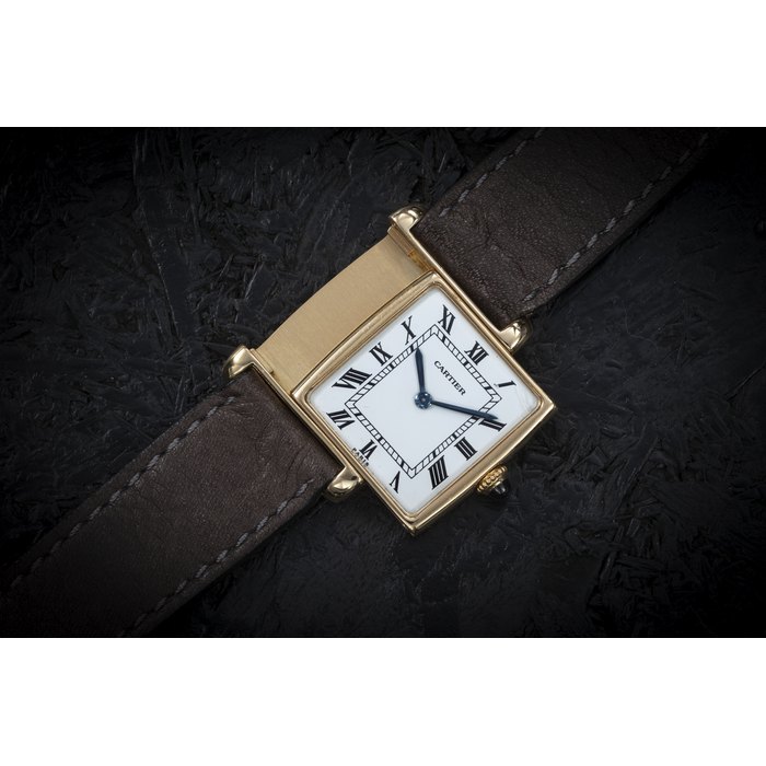 CARTIER PARIS, TANK ‘REVERSO’, A FINE MANUAL-WINDING GOLD WRISTWATCH WITH REVERSIBLE CASE CASE NUMBER: 030’411