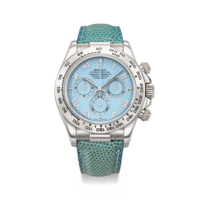 ROLEX. A RARE AND VIBRANT 18K WHITE GOLD AUTOMATIC CHRONOGRAPH WRISTWATCH WITH TURQUOISE DIAL SIGNED ROLEX, DAYTONA 'BEACH' MODEL, REF. 116519, CASE NO. Y135078, CIRCA 2002