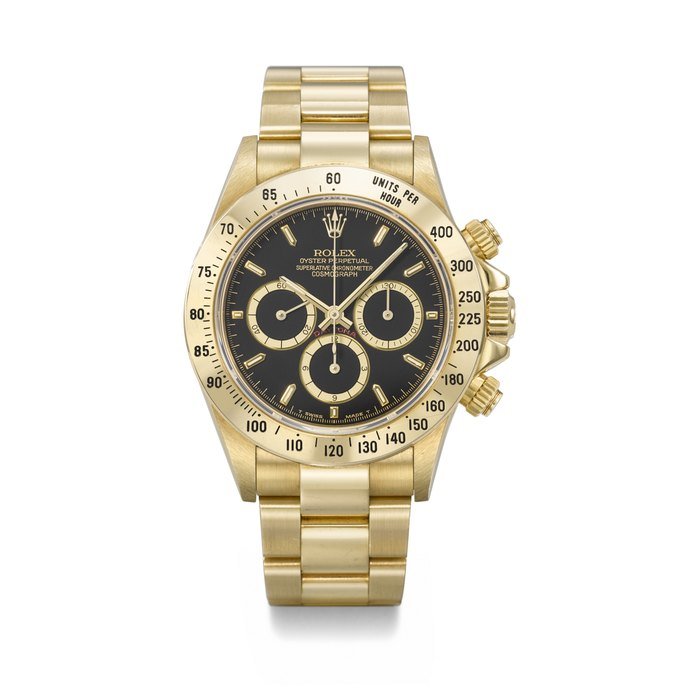 Rolex ROLEX. A VERY RARE AND ATTRACTIVE 18K GOLD AUTOMATIC CHRONOGRAPH WRISTWATCH WITH 'FOUR LINES' DIAL AND BRACELET SIGNED ROLEX, DAYTONA MODEL, REF. 16528, CASE NO. L235996, CIRCA 1989 · 16528