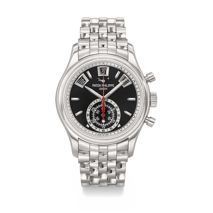 PATEK PHILIPPE. A VERY RARE AND ATTRACTIVE STAINLESS STEEL AUTOMATIC ANNUAL CALENDAR FLYBACK CHRONOGRAPH WRISTWATCH WITH POWER RESERVE, DAY/NIGHT INDICATOR AND BRACELET SIGNED PATEK PHILIPPE, REF. 5960/1A-010, MOVEMENT NO. 7'064'301, CASE NO. 6'097'884, CIRCA 2018