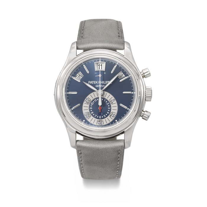 PATEK PHILIPPE. AN ATTRACTIVE PLATINUM AUTOMATIC ANNUAL CALENDAR FLYBACK CHRONOGRAPH WRISTWATCH WITH POWER RESERVE AND DAY/NIGHT INDICATOR SIGNED PATEK PHILIPPE, REF. 5960P-015, MOVEMENT NO. 3'507'280, CASE NO. 4'506'550, CIRCA 2010