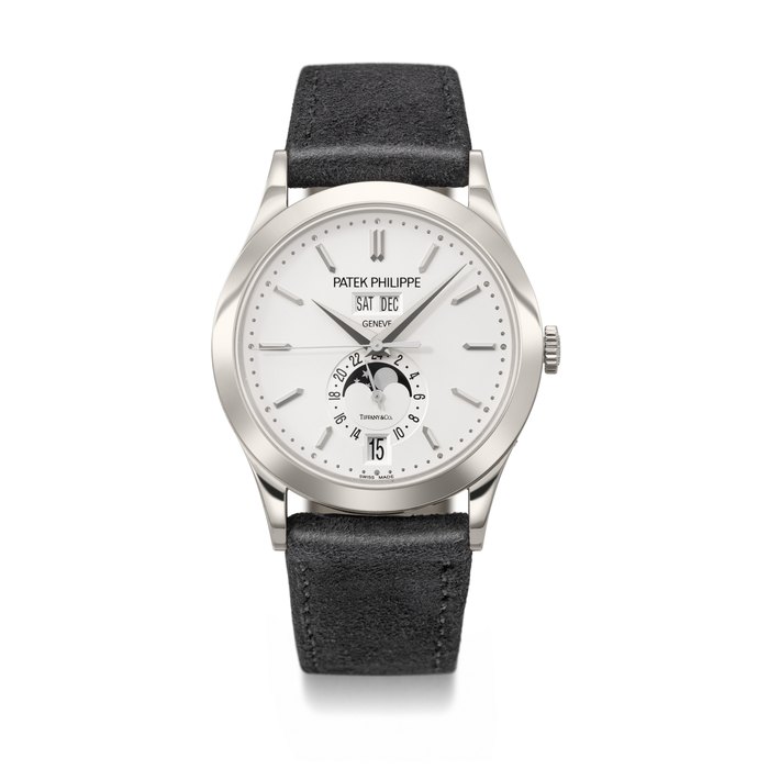 PATEK PHILIPPE. A VERY RARE AND ATTRACTIVE 18K WHITE GOLD AUTOMATIC ANNUAL CALENDAR WRISTWATCH WITH SWEEP CENTRE SECONDS, MOON PHASES AND 24-HOUR INDICATION SIGNED PATEK PHILIPPE, RETAILED BY TIFFANY & CO., REF. 5396G-011, MOVEMENT NO. 7'388'108, CASE NO. 6'442'689, CIRCA 2021