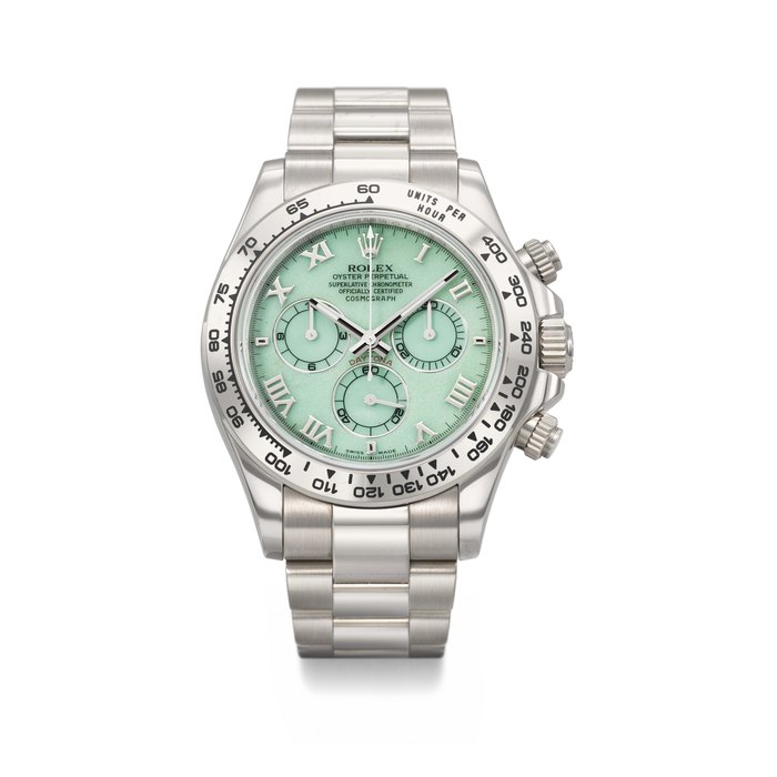 ROLEX. AN ATTRACTIVE 18K WHITE GOLD AUTOMATIC CHRONOGRAPH WRISTWATCH WITH GREEN CHRYSOPRASE DIAL AND BRACELET SIGNED ROLEX, DAYTONA MODEL, REF. 116509, CASE NO. V412411, CIRCA 2009