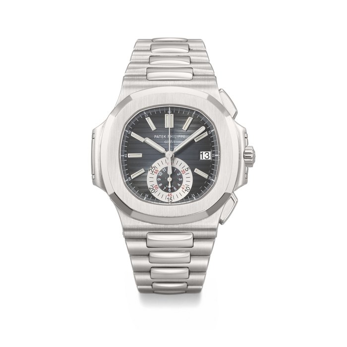 PATEK PHILIPPE. AN ATTRACTIVE STAINLESS STEEL AUTOMATIC FLYBACK CHRONOGRAPH WRISTWATCH WITH DATE AND BRACELET SIGNED PATEK PHILIPPE, NAUTILUS MODEL, REF. 5980/1A-001, MOVEMENT NO. 3'666'540, CASE NO. 4'384'053, CIRCA 2007