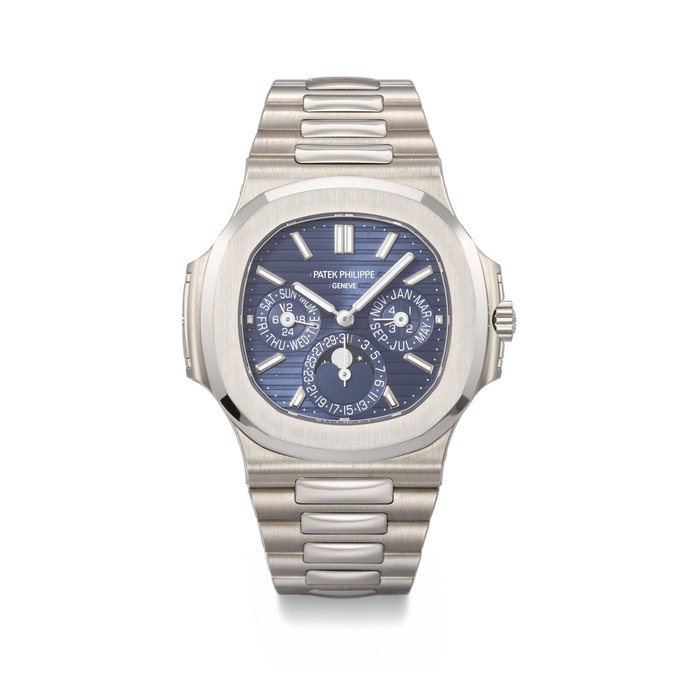 Patek Philippe PATEK PHILIPPE. A RARE AND COVETED 18K WHITE GOLD AUTOMATIC PERPETUAL CALENDAR WRISTWATCH WITH MOON PHASES, 24 HOUR, LEAP YEAR INDICATION AND BRACELET SIGNED PATEK PHILIPPE, NAUTILUS MODEL, REF. 5740/1G-001, MOVEMENT NO. 7'394'653, CASE NO. 6'446'947, CIRCA 2021, Price & Market Data