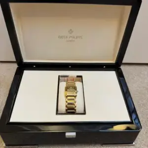 Patek Philippe Patek Philippe Twenty~4 4907/1J-010 22mm Yellow gold Brown