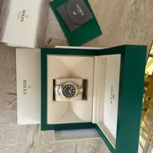 Rolex Rolex Explorer 124273 (TWO-TONE) 36mm Yellow gold and Stainless steel Black, Price & Market Data