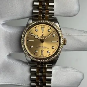 Tudor TudorBlack Bay 36 S&g Champagne dial with a diamond set bezel