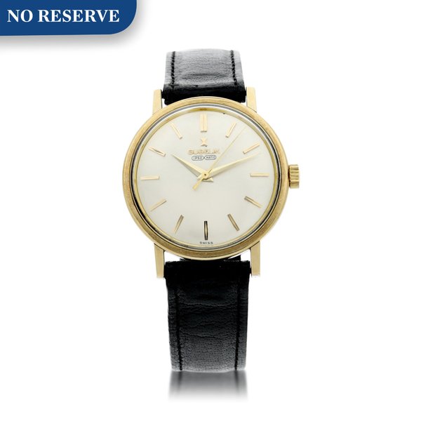 Gübelin IPSO-DAY A GOLD PLATED AND STAINLESS STEEL AUTOMATIC WRISTWATCH, CIRCA 1965
