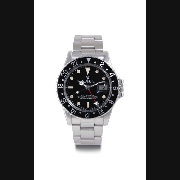 Rolex ROLEX. A STAINLESS STEEL AUTOMATIC WRISTWATCH WITH DATE, CENTER SECONDS, 24 HOURS AND BRACELET SIGNED ROLEX, OYSTER PERPETUAL, GMT-MASTER, CASE NO. 5179044, REF. 1675, CIRCA 1977 · 1675