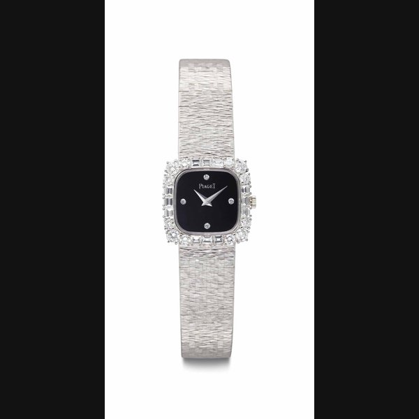 Piaget. A Lady's 18k White Gold and Diamond-set Bracelet Watch Signed Piaget, No.'s 4910A6, and 334294, Manufactured in 1979