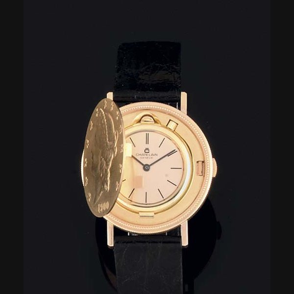 Chatelain Chatelain. An 18ct Gold Concealed 20 Dollar coin watch SIGNED CHATELAIN GENEVE, CASE NO 17070, CIRCA 1990