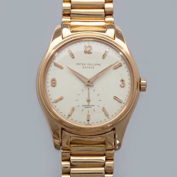 Patek Philippe PATEK PHILIPPE CALATRAVA 2526R Arabic Enamel Dial with Bracelet 18k RG retailed by Serpico Y Laino 