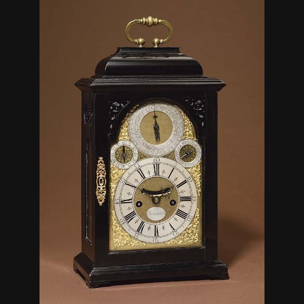 A George I ebonised quarter-striking eight day table clock with unusual year calendar FIRST QUARTER 18TH CENTURY AND LATER