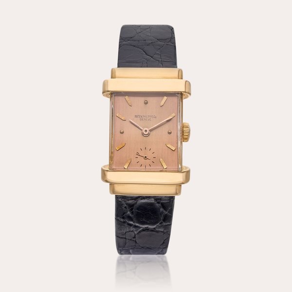 Patek Philippe & Co. Reference 1450 ‘Top Hat Pink on Pink' | A pink gold rectangular wristwatch with pink dial, Circa 1945