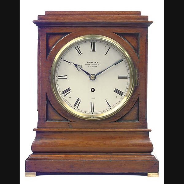 A Victorian oak and brass-mounted mantel timepiece, last quarter 19th Century