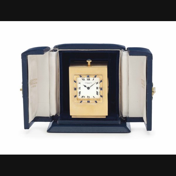 Vacheron Constantin Vacheron Constantin. An 18k Gold and Sapphire Quarter Repeating Desk Clock with Presentation Box SIGNED VACHERON CONSTANTIN, GENÈVE, MOVEMENT SIGNED NOCTURNE, MOVEMENT NO. 2255, CIRCA 1940