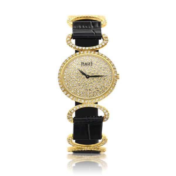 Piaget Reference 9802 | DB A yellow gold and diamond-set wristwatch, Circa 1970 | 伯爵 型號9802 DB | 黃金鑲鑽石腕錶，約1970年製 · 9802