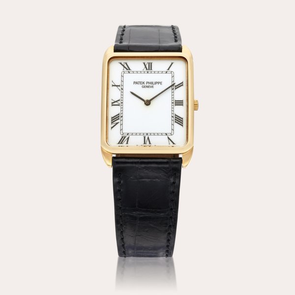 Patek Philippe Reference 3803 | A yellow gold rectangular wristwatch, Made in 1985
