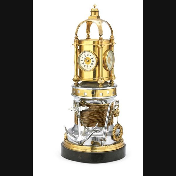 A French Brass A French brass, nickel plated and black marble automaton nautical double-dialled timepiece CIRCA 1870