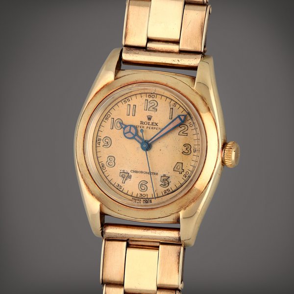 Rolex 'Bubbleback', Reference 3131 | A yellow gold wristwatch with bracelet | Circa 1946