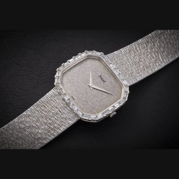 Piaget PIAGET, REF. 97810 A 6, A GOLD MANUAL-WINDING WRISTWATCH WITH BAGUETTE-CUT DIAMOND BEZEL CASE NUMBER: 264201, MOVEMENT NUMBER 758475, Price & Market Data