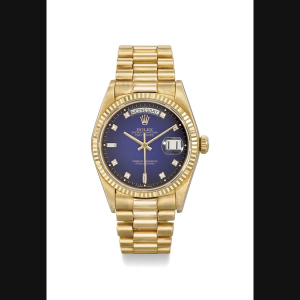 Rolex. A very fine and rare 18K gold and diamond-set automatic wristwatch with sweep centre seconds, day, date, bracelet, blue “dégradé dial”, display clip and box Signed Rolex, Oyster Perpetual, Day-Date, ref. 18038, case no 9’399’528, circa 1985
