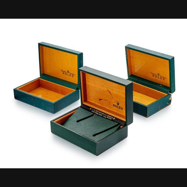 Rolex A set of three leather and wooden presentation boxes, Circa 1960 to 1980 | 勞力士 | 一套三件皮製及木製盒子，約1960到1980年製