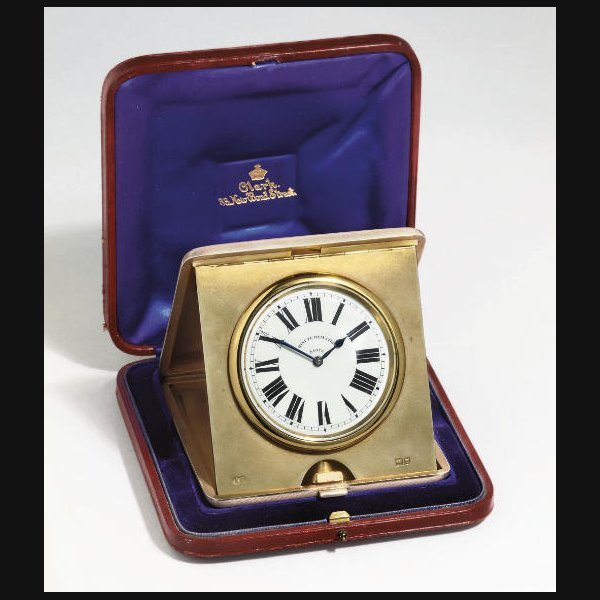  An unusual Edwardian silver minute-repeating eight day travel timepiece ALFRED CLARK, LONDON. CIRCA 1910